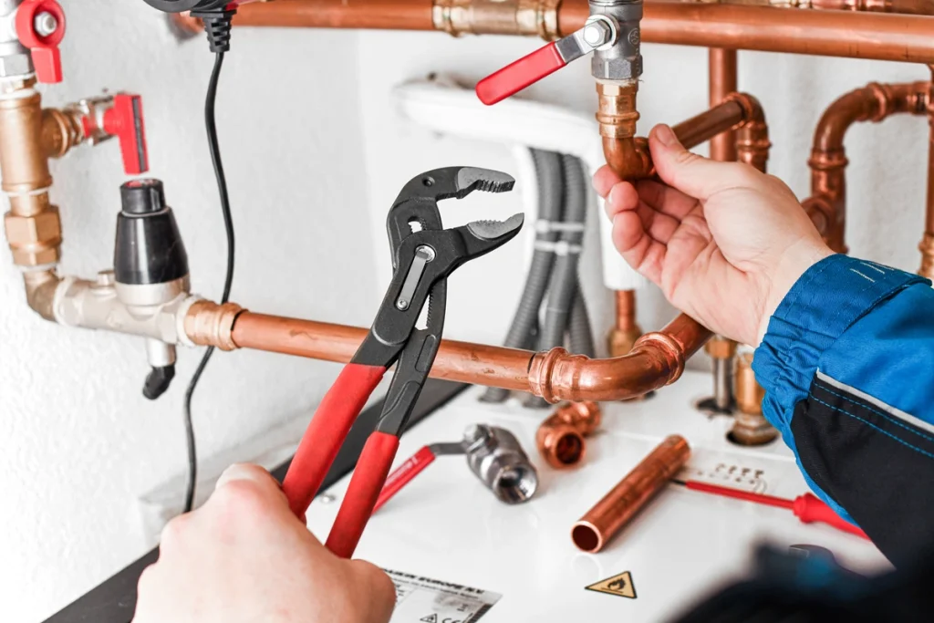 worker-repairing-the-plumbing-system