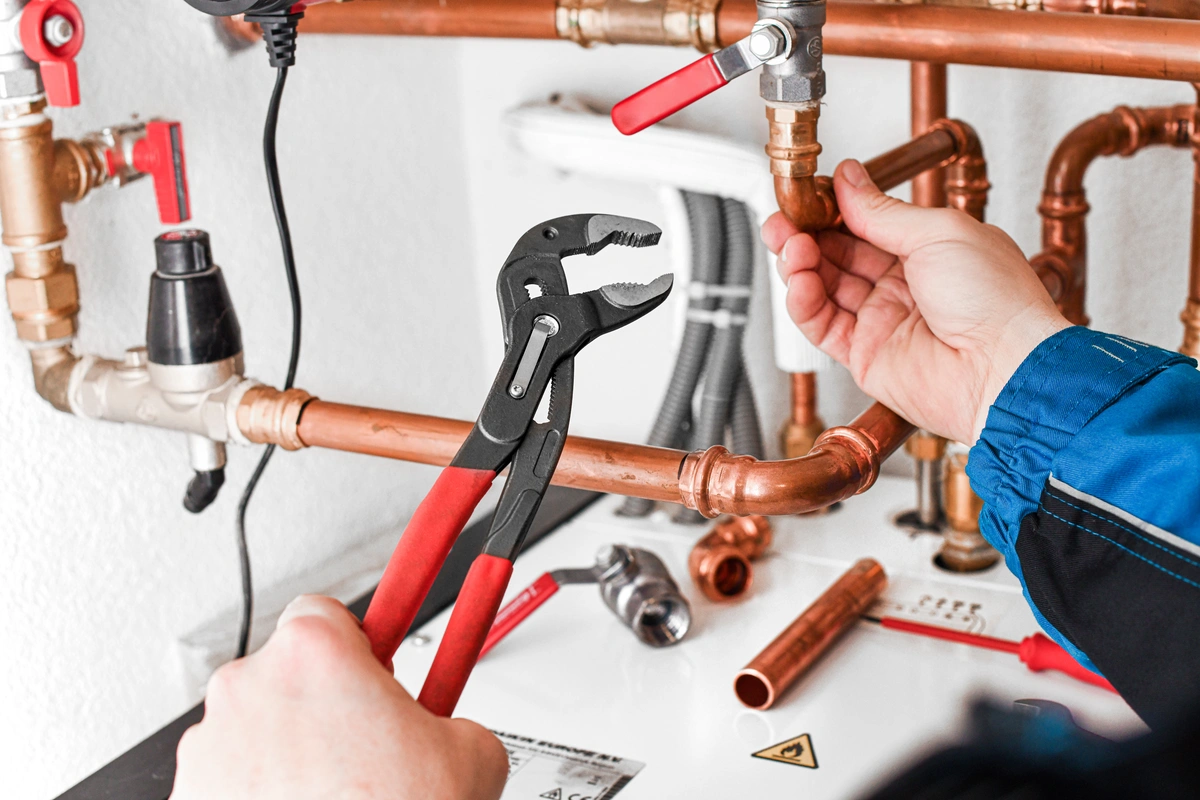 worker-repairing-the-plumbing-system